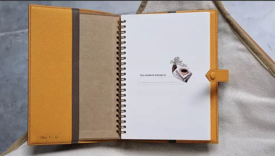 Sổ tay bìa da dập logo làm quà tặng nhân viên của KOI Leather