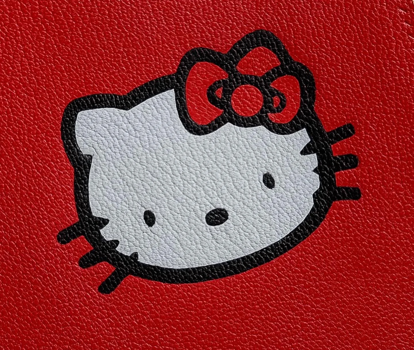 Ảnh Studio Bao da hộ chiếu da dê Alran. Ghép da Hello Kitty - Koi Leather