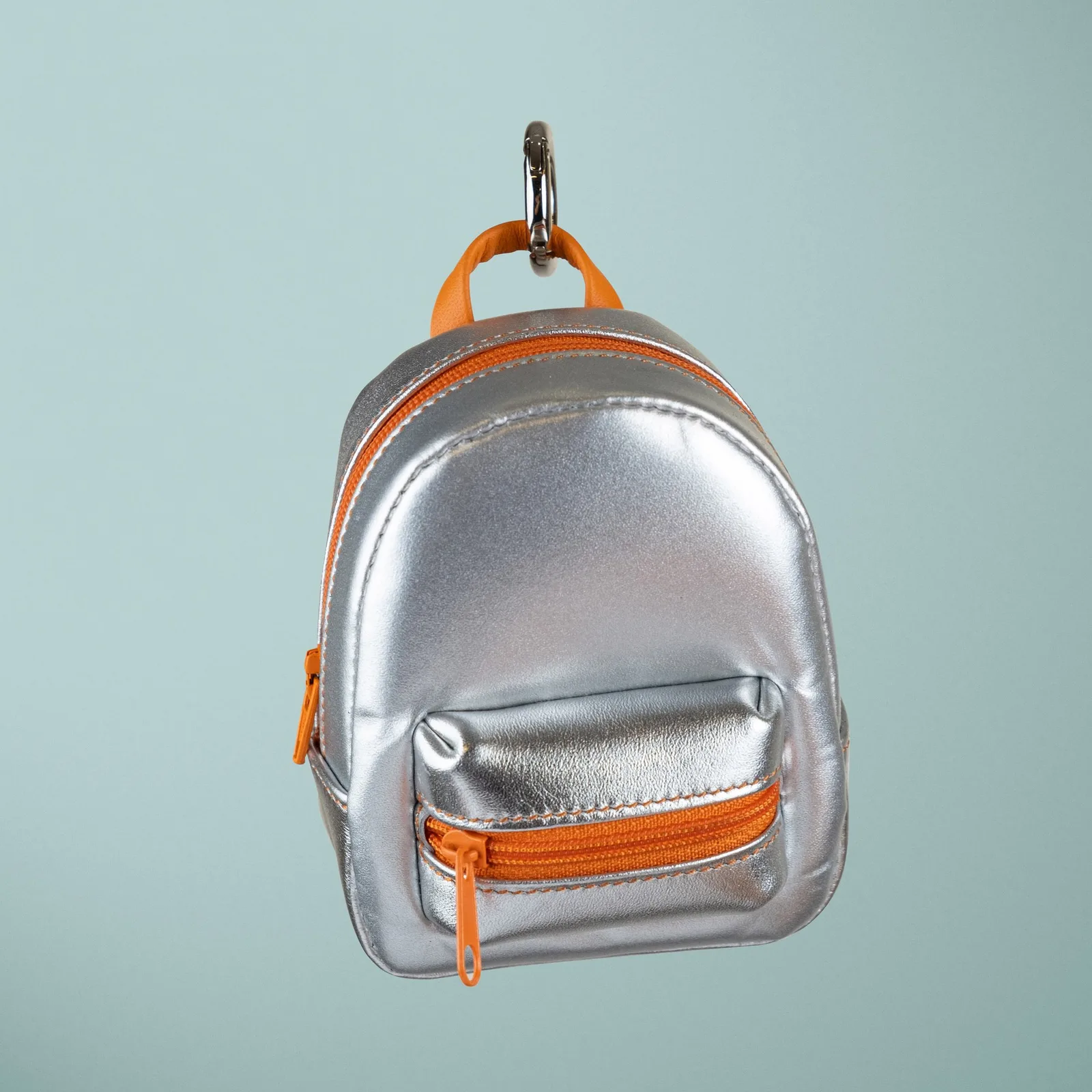 Ảnh Studio Charm đeo túi dáng balo mini da ánh kim bạc - Koi Leather