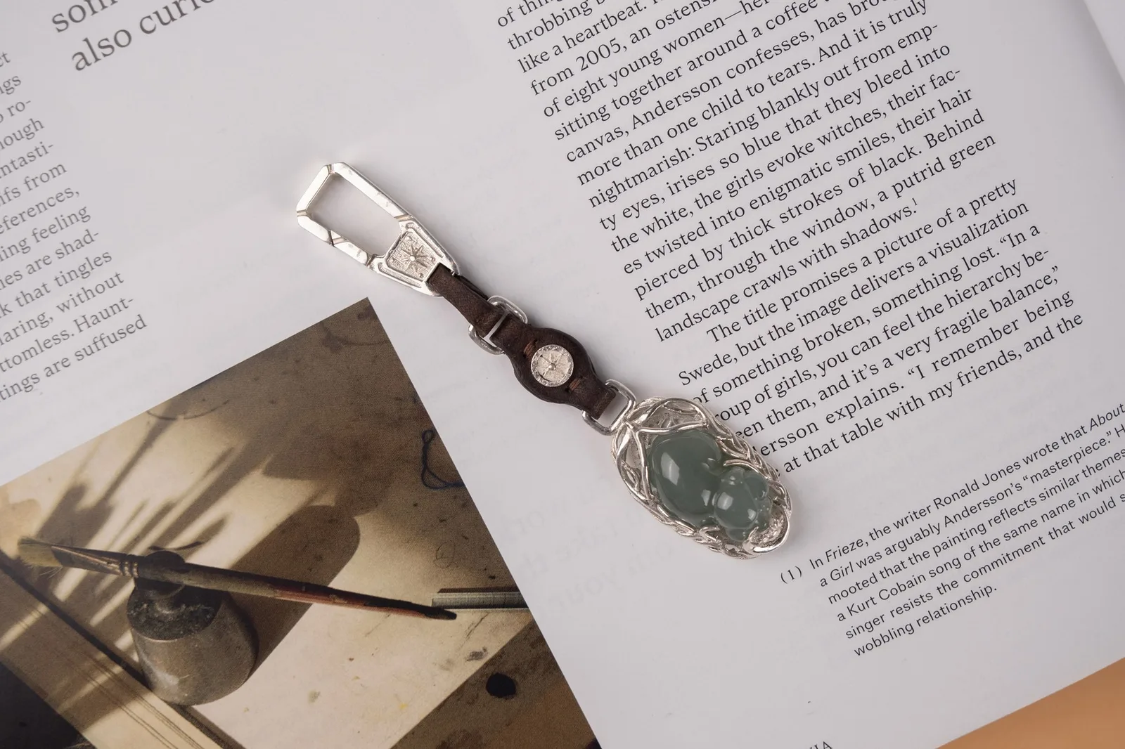 Ảnh Lifestyle Charm móc treo da nâu phối chi tiết bạc và mặt ngọc - Koi Leather