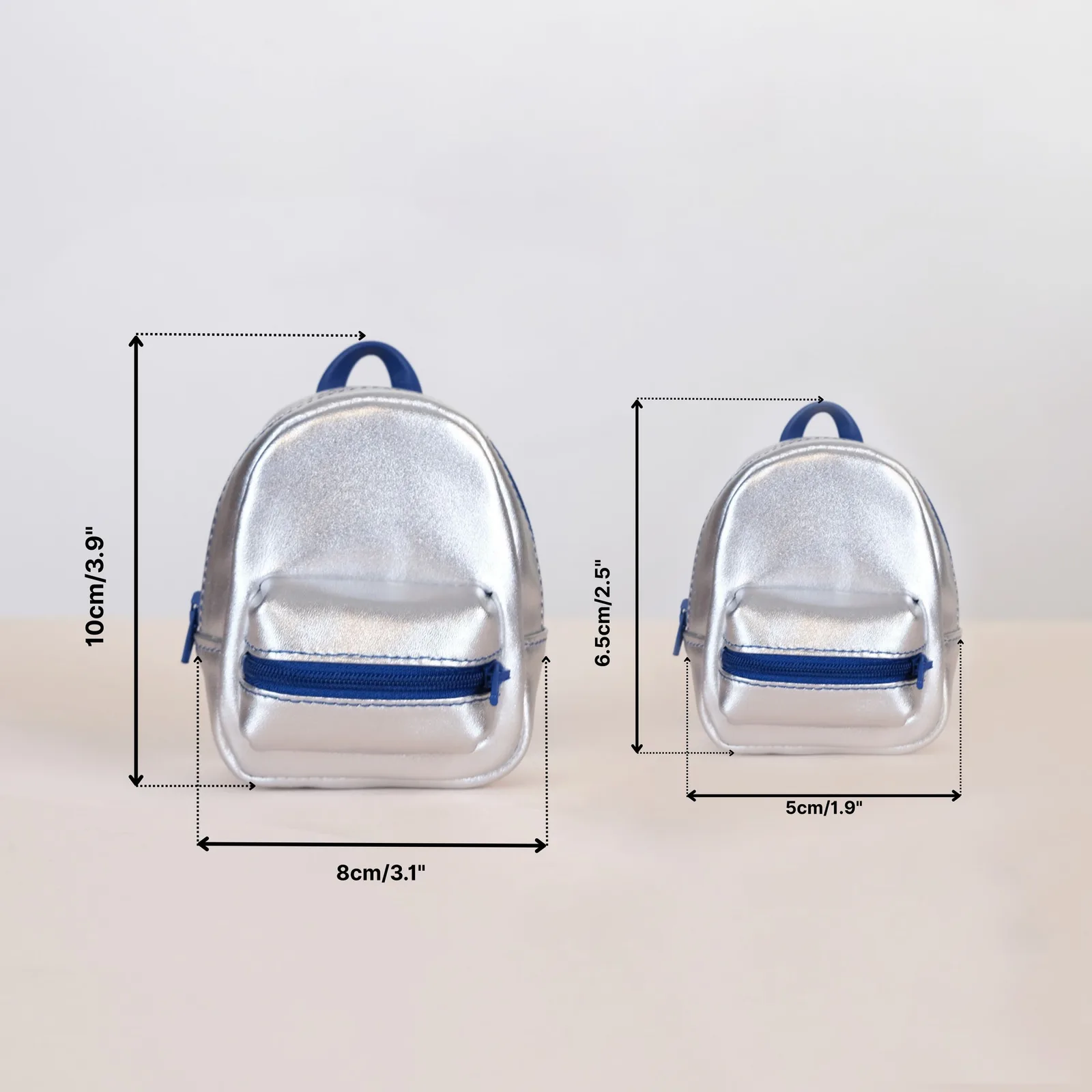 Ảnh Studio Charm balo mini da màu bạc phối xanh navy - Koi Leather