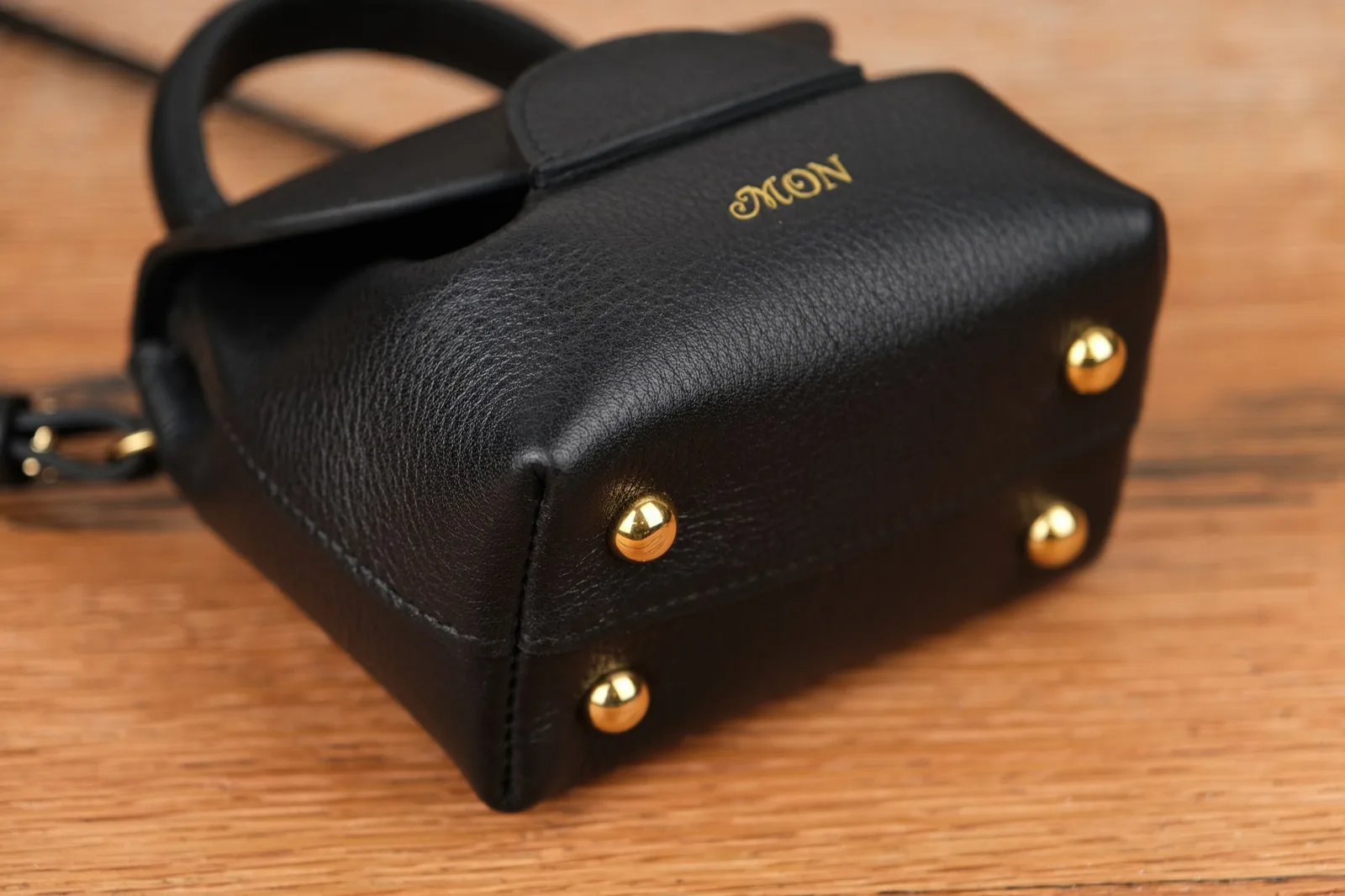Ảnh Studio Túi mini da Togo màu đen quai xách kèm dây đeo chéo - Koi Leather
