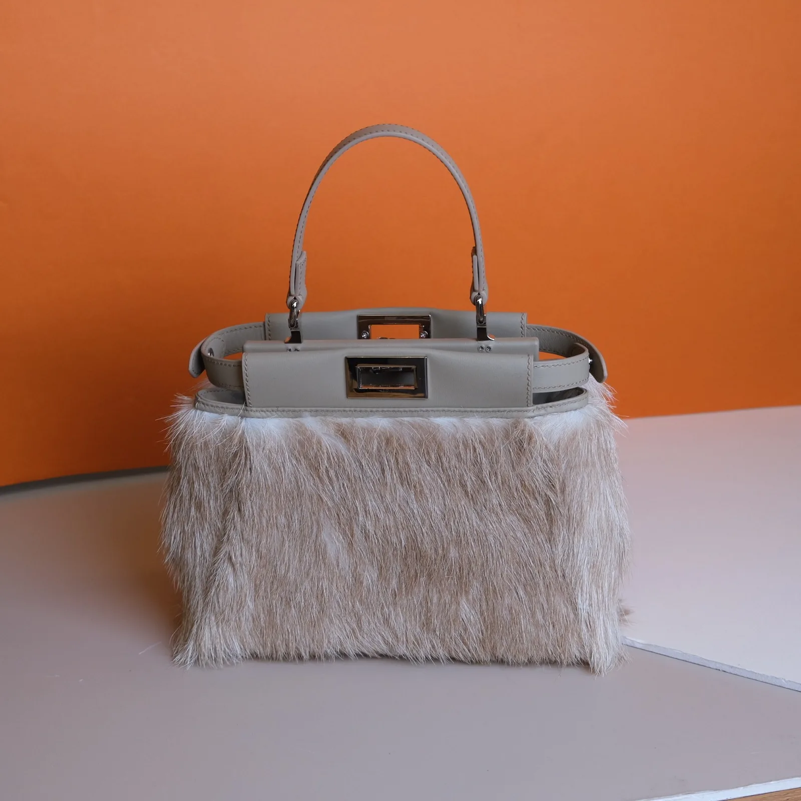Ảnh Studio Áo bọc túi xách da bò nguyên lông màu be xám - Koi Leather