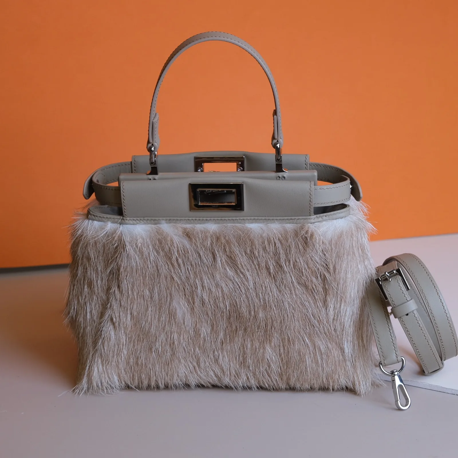 Ảnh Studio Áo bọc túi xách da bò nguyên lông màu be xám - Koi Leather
