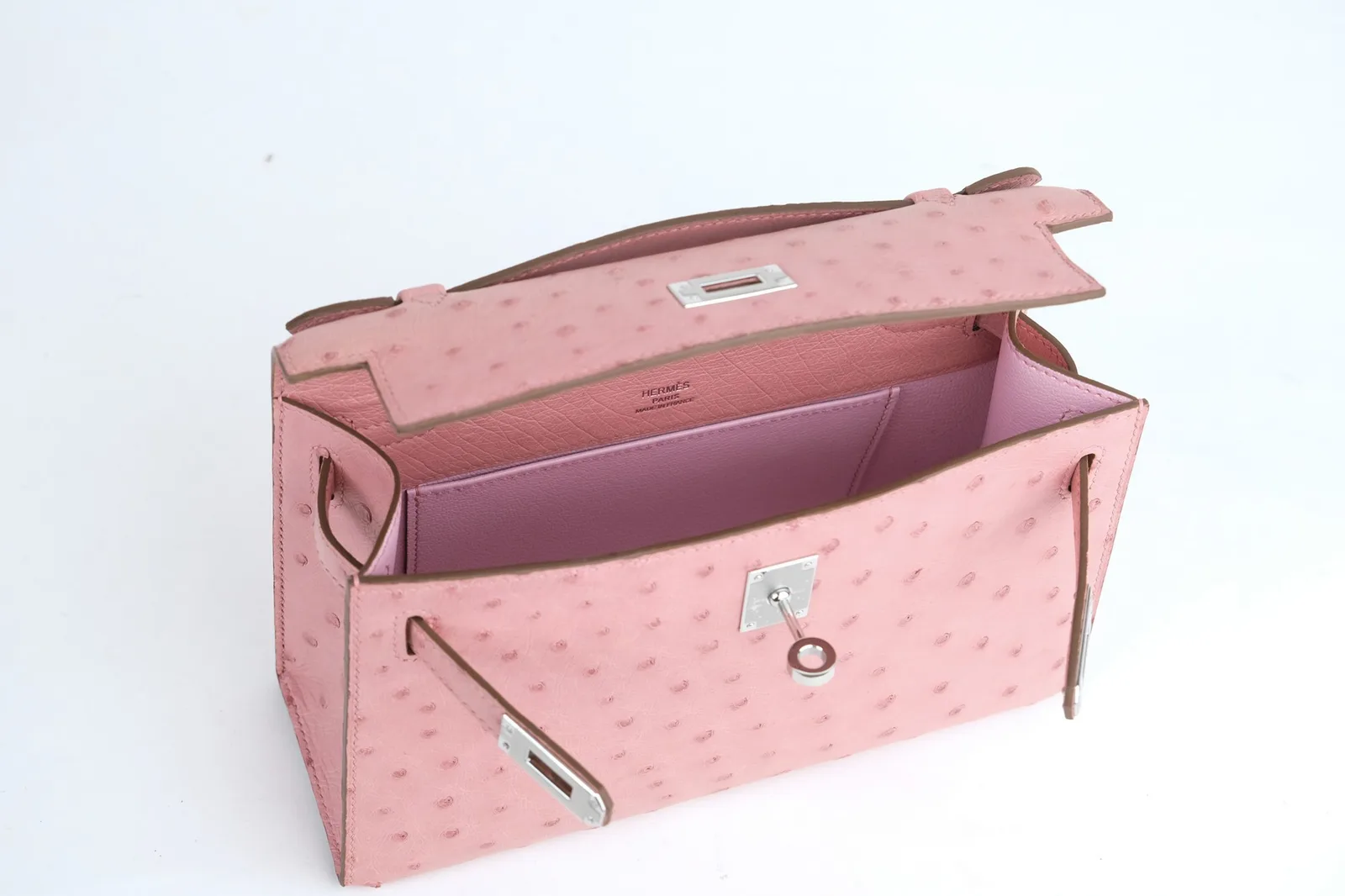 Ảnh Studio Túi clutch da đà điểu quai xách nắp gập khoá xoay - Koi Leather