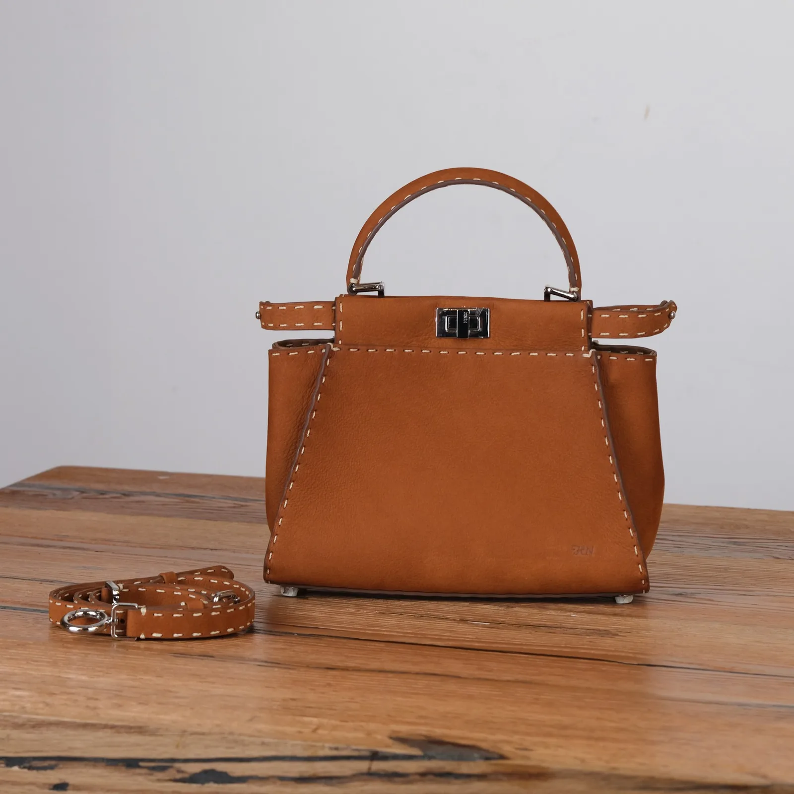 Ảnh Studio Túi xách nữ da Nubuck màu vàng bò quai cầm may chỉ nổi - Koi Leather