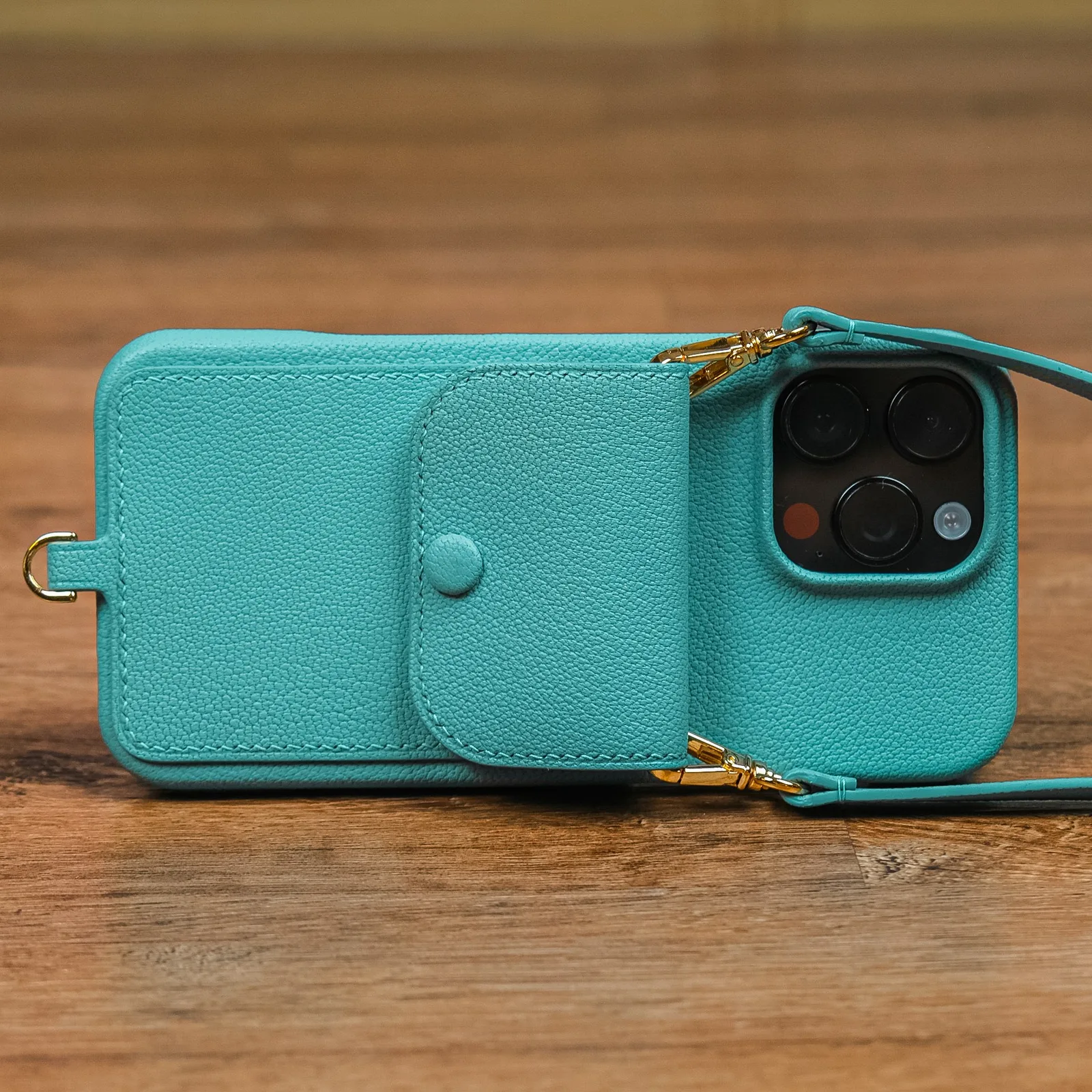 Ảnh Studio Ốp điện thoại da hạt màu teal kèm ngăn ví và dây đeo - Koi Leather
