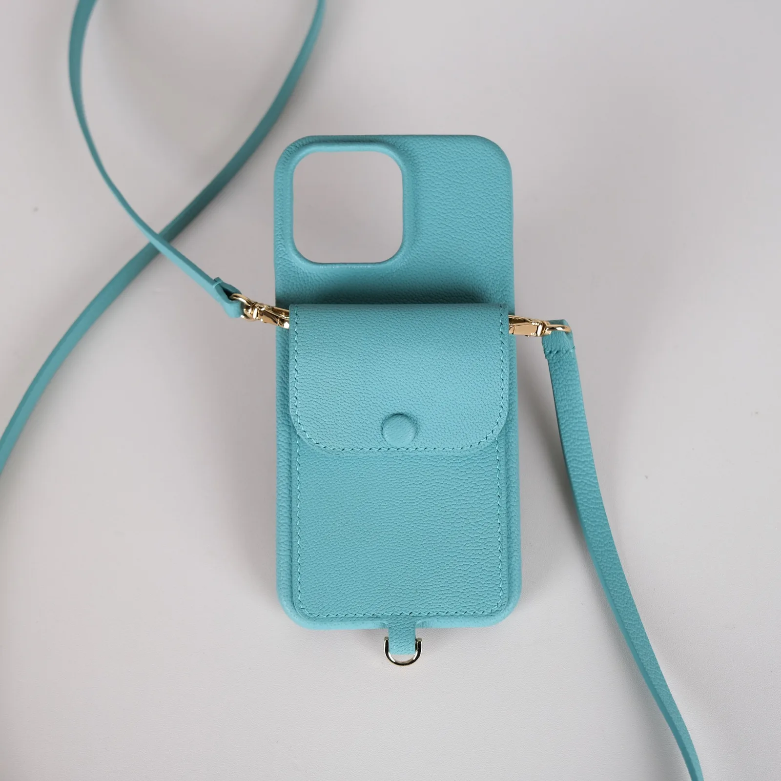 Ảnh Studio Ốp điện thoại da hạt màu teal kèm ngăn ví và dây đeo - Koi Leather